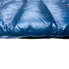 Close-up detail of Jacks R Better Hudson River Ultralight 20 degree backpacking quilt showing Moroccan Blue Argon 67 ripstop shell and baffle loft