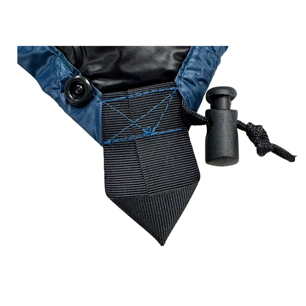 Close-up detail of Jacks R Better Shenandoah Ultralight 40 degree backpacking quilt showing corner attachment loop and Moroccan Blue Argon 67 shell