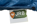 Close-up of the woven Jacks R Better logo tag on the Shenandoah Ultralight 40 degree backpacking quilt