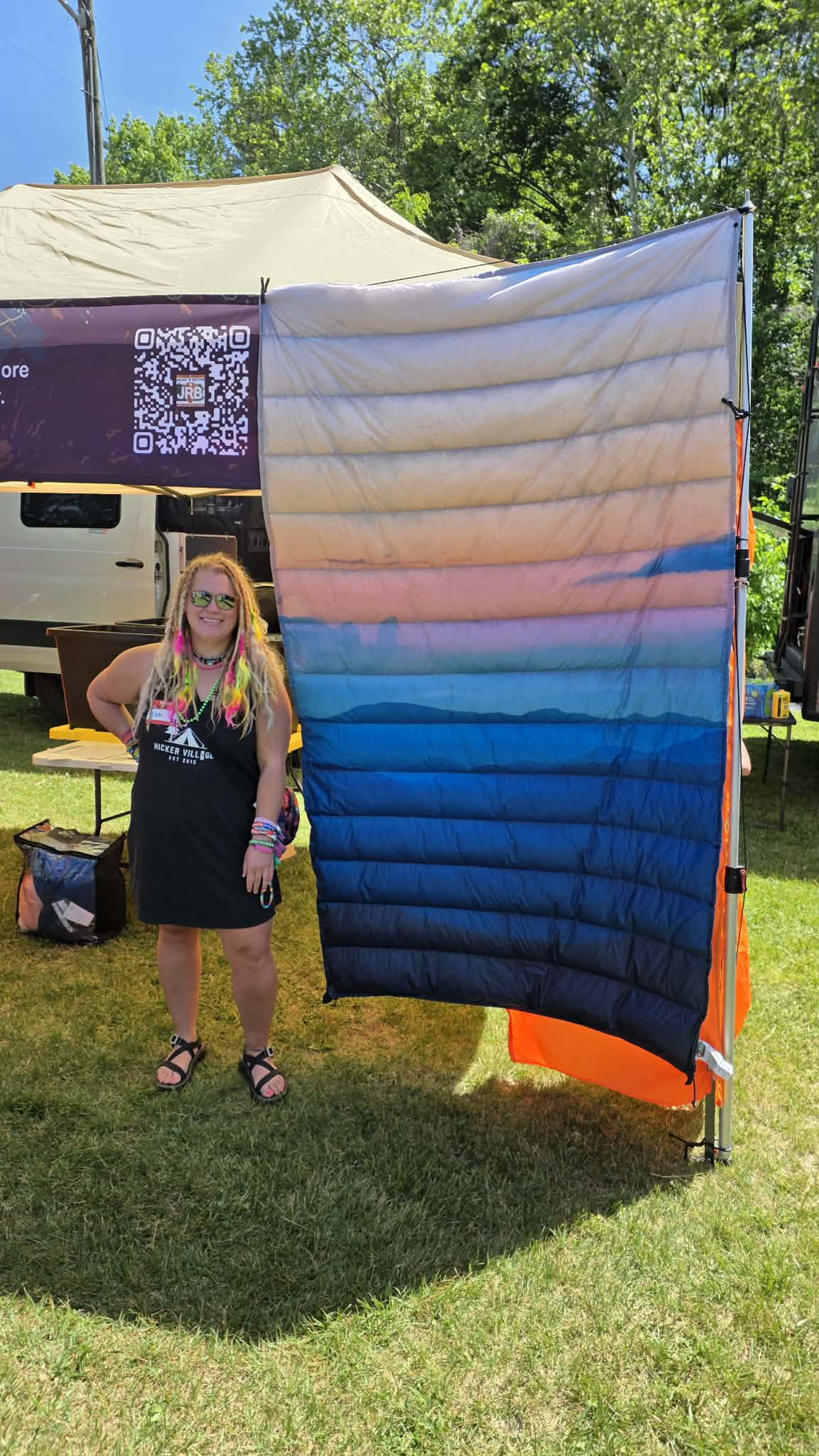 Jacks R Better Wayah Bald Sunset 40°F ultralight quilt shown outdoors on the trail