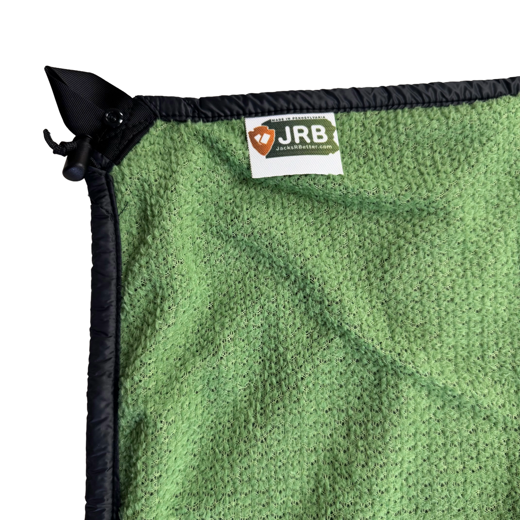 Jacks R Better Wind Gap Alpha close-up of the Alpha Direct 90 active insulation texture with JRB logo tag
