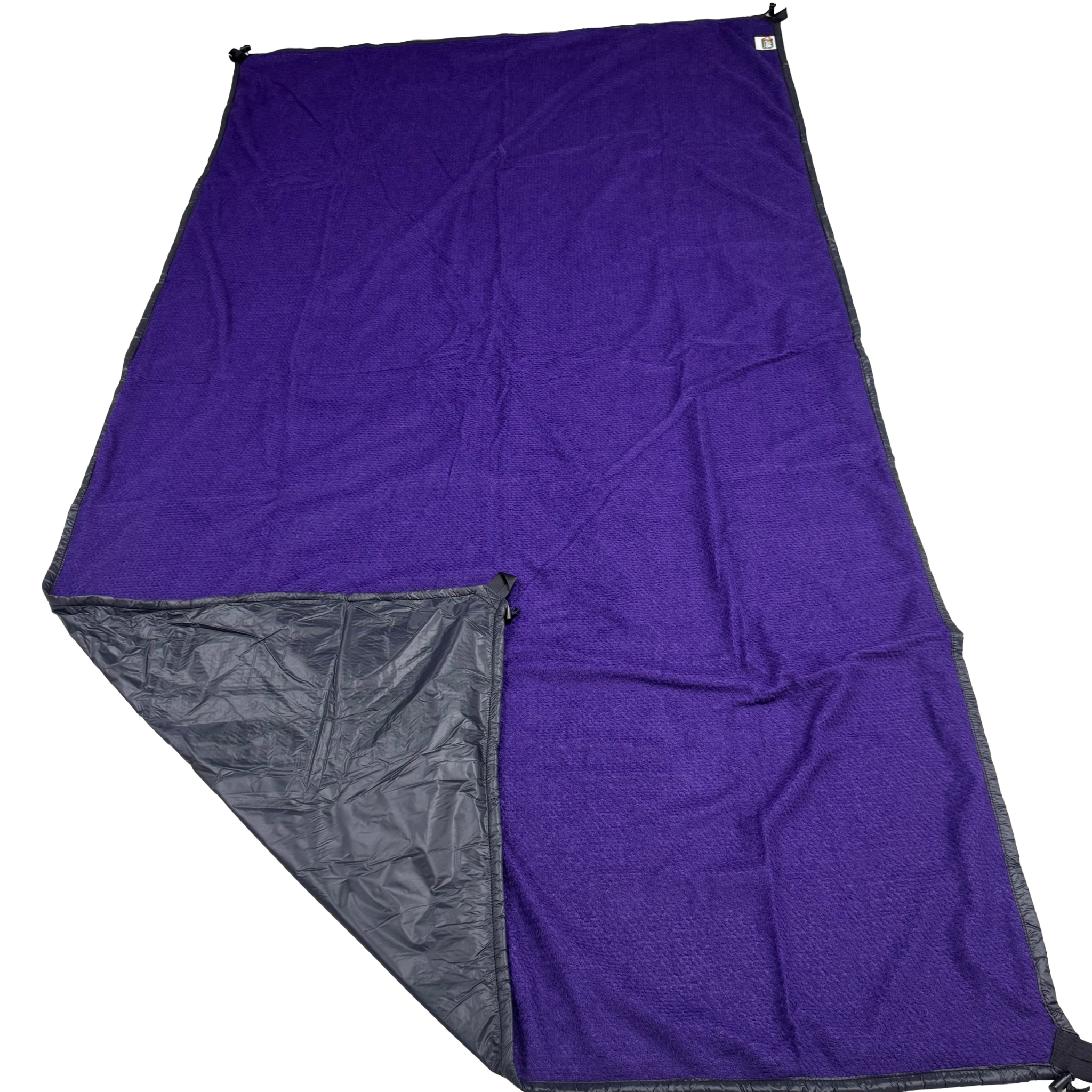 Jacks R Better Wind Gap Alpha multifunction wind liner in Purple Grape Alpha Direct with the black Ion 1.1 windproof shell corner folded back
