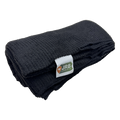 Polartec Alpha Direct Trail 90 quilt liner in black, folded to show the open grid-knit face and the JRB Made in Pennsylvania label