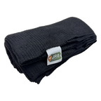 Polartec Alpha Direct Trail 90 quilt liner in black, folded to show the open grid-knit face and the JRB Made in Pennsylvania label