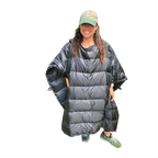 Woman wearing the Jacks R Better Sierra Stealth 40° wide wearable down quilt as a wrap, front view